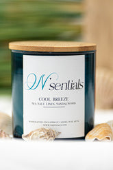 N'Sentials Cool Breeze Candle, a refreshing spring fragrance made from coconut and apricot wax. Vegan and eco-friendly with sea salt and linen notes.